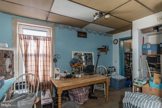 office with a paneled ceiling