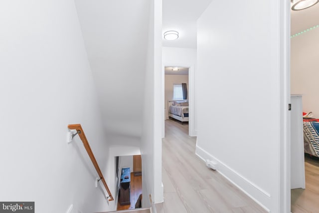 corridor featuring light hardwood / wood-style floors