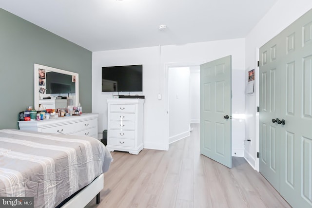 bedroom featuring light wood-type flooring