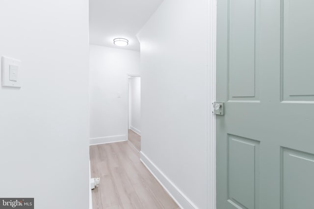 hallway featuring light wood-type flooring