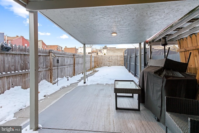 view of snow covered patio