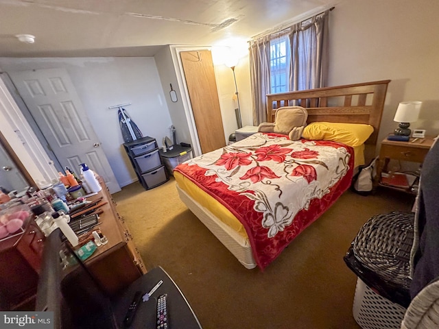 bedroom featuring carpet