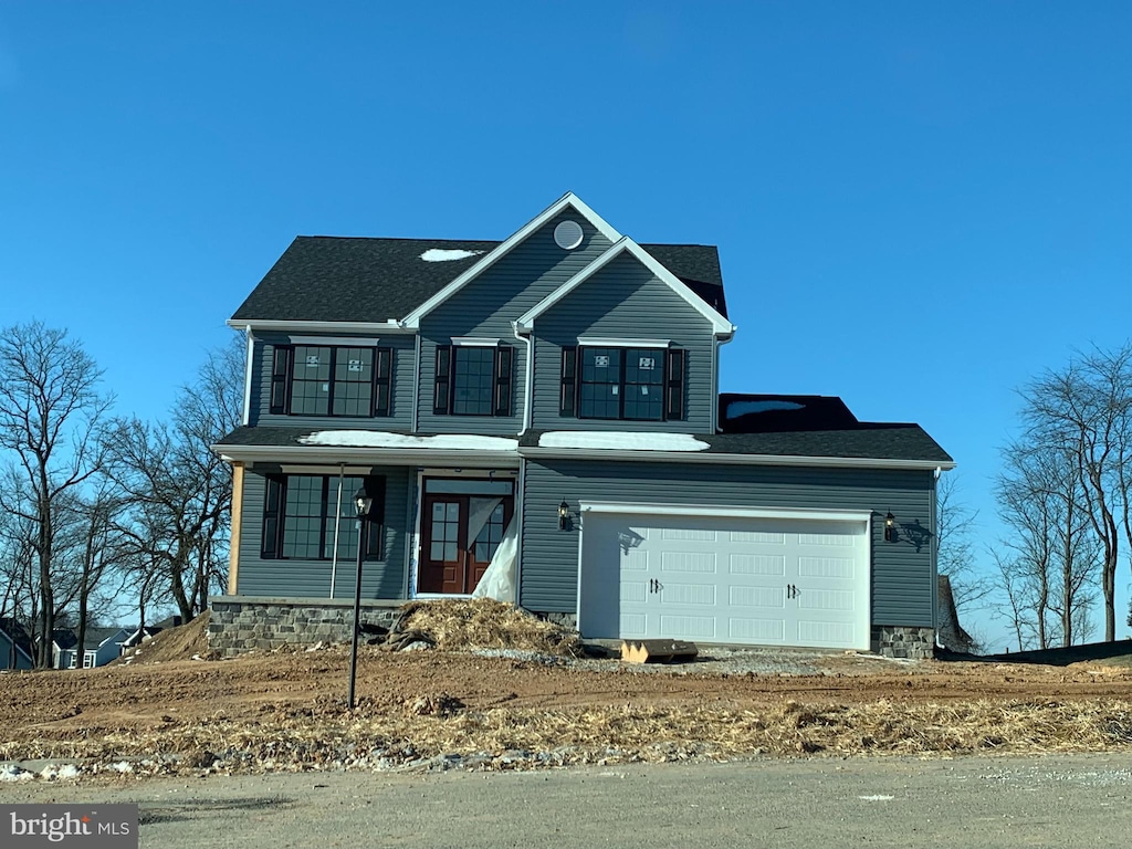 view of front of property featuring a garage