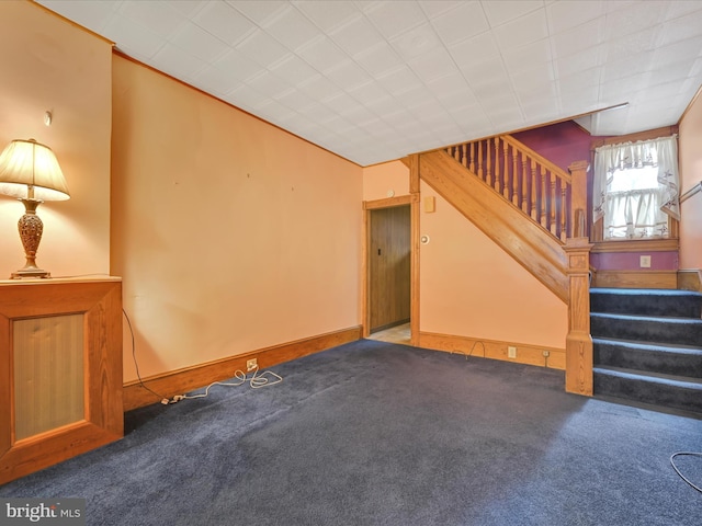 unfurnished living room with carpet floors