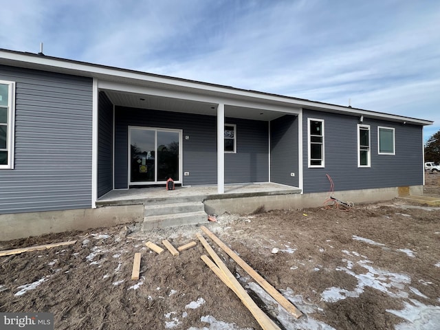 back of house featuring a patio