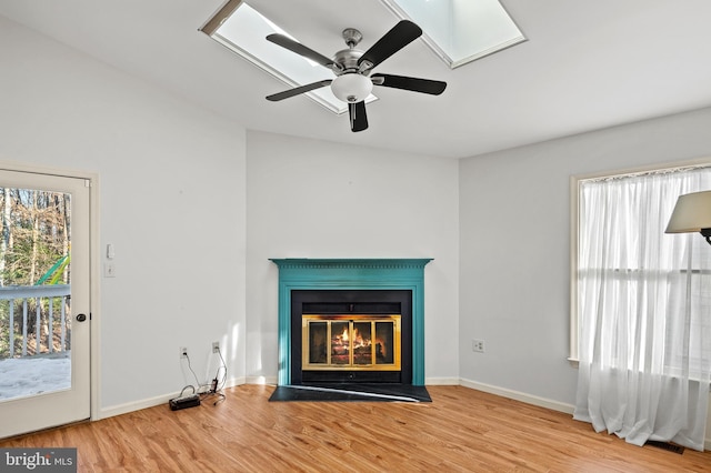 room details with ceiling fan and hardwood / wood-style floors