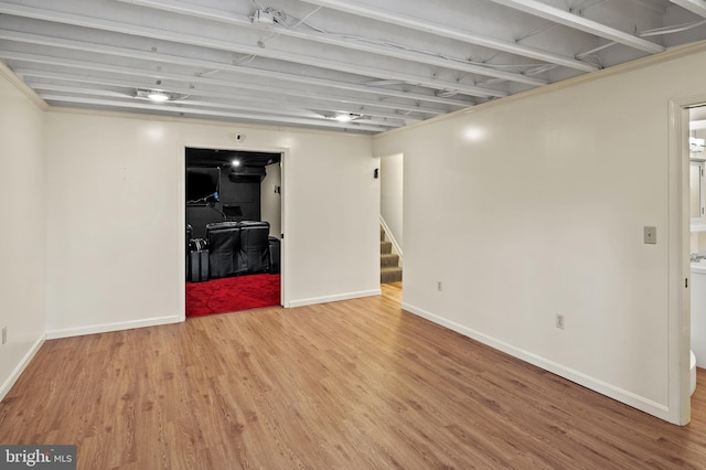 basement with wood-type flooring