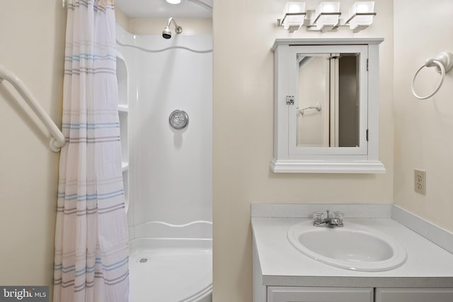 bathroom featuring vanity and walk in shower