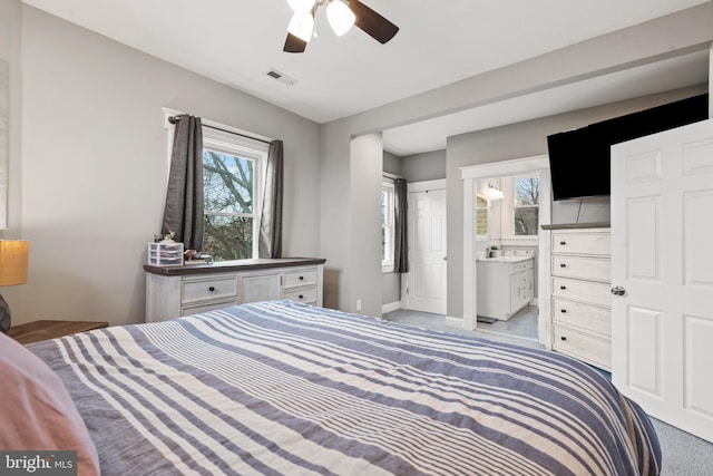 carpeted bedroom with ceiling fan