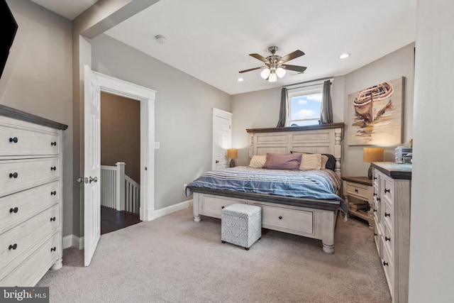 bedroom with ceiling fan and carpet flooring