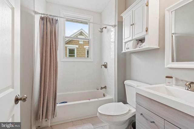 full bathroom featuring vanity, shower / tub combo with curtain, and toilet