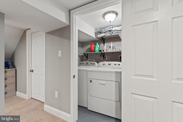 washroom featuring light colored carpet and separate washer and dryer