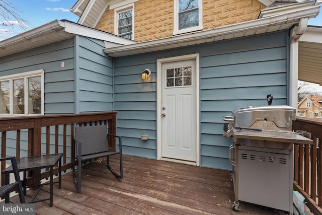 wooden deck with grilling area