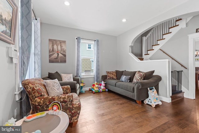 living room with dark wood-type flooring