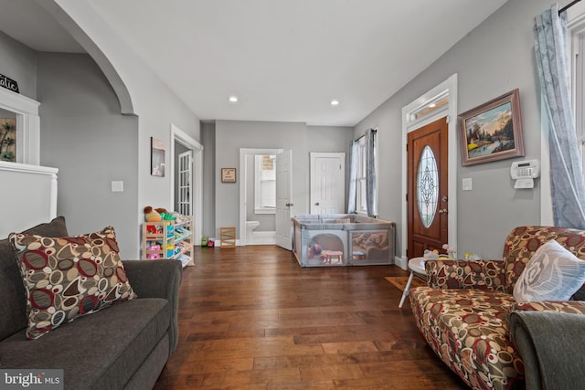 living room with dark wood-type flooring