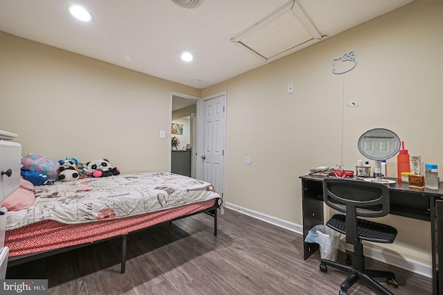 bedroom featuring hardwood / wood-style flooring