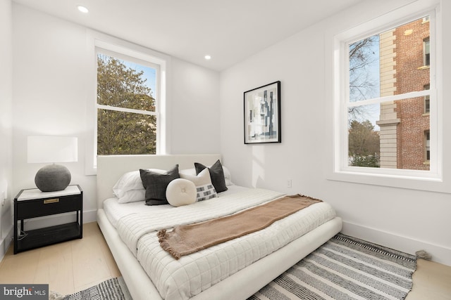 bedroom featuring light hardwood / wood-style floors