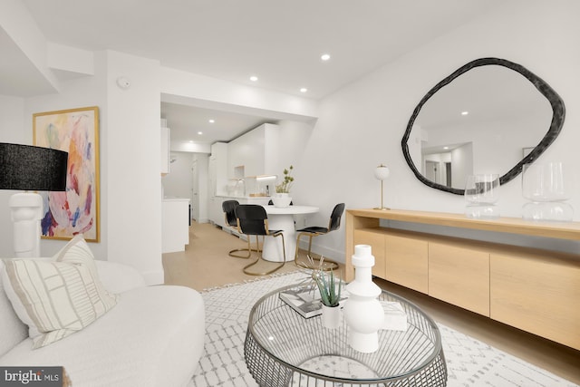 interior space with sink and light hardwood / wood-style floors