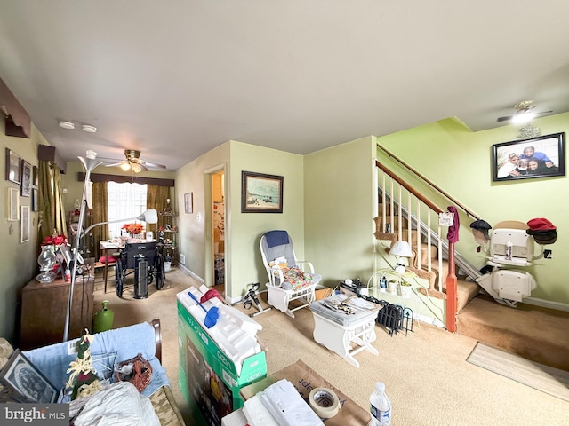 living room with carpet flooring and ceiling fan