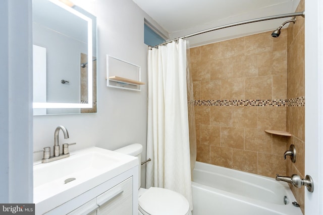 full bathroom featuring vanity, toilet, and shower / bath combo with shower curtain