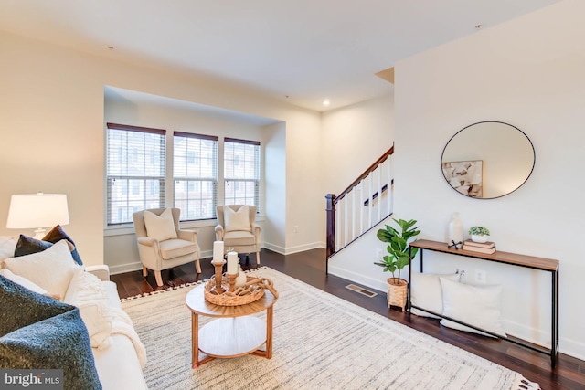 living room featuring dark hardwood / wood-style flooring