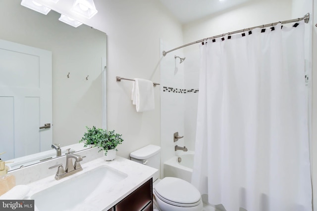 full bathroom with shower / bath combo, toilet, and vanity