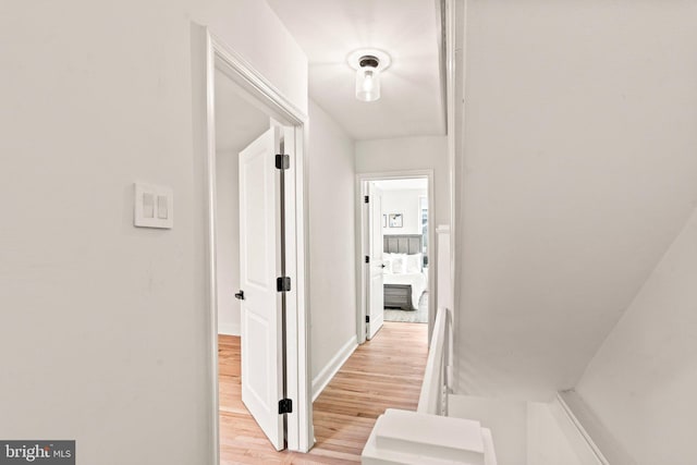 corridor featuring light hardwood / wood-style flooring