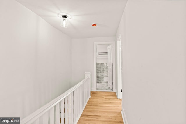 corridor featuring light hardwood / wood-style floors