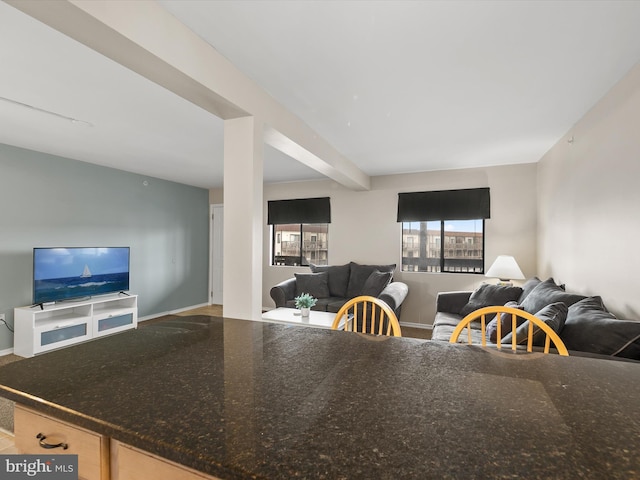 dining room with beamed ceiling