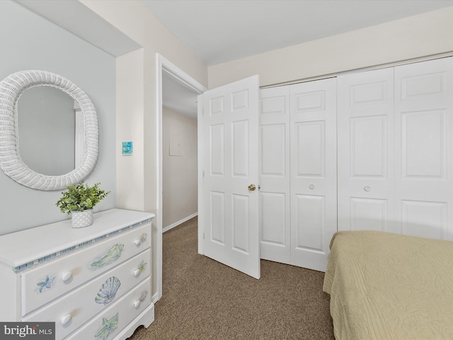 carpeted bedroom with a closet