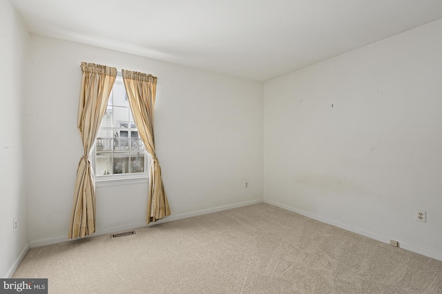 spare room with carpet flooring