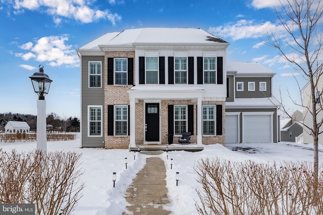 view of front of home with a garage