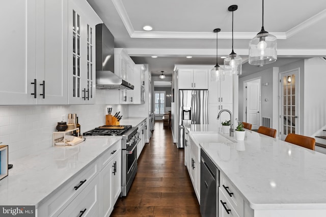 1335 Ashton Rd, Mechanicsburg, PA 17055 - kitchen featuring a large island, wall chimney exhaust hood, a sink, appliances with stainless steel finishes, and dark wood finished floors