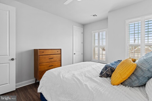 1335 Ashton Rd, Mechanicsburg, PA 17055 - bedroom with dark wood-style flooring, visible vents, baseboards, and ceiling fan