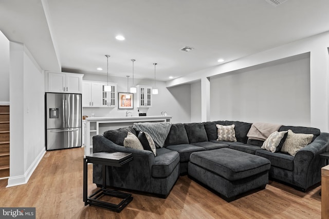 1335 Ashton Rd, Mechanicsburg, PA 17055 - living area featuring visible vents, baseboards, recessed lighting, and light wood-style floors
