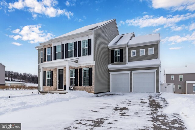 1335 Ashton Rd, Mechanicsburg, PA 17055 - colonial inspired home featuring an attached garage and brick siding