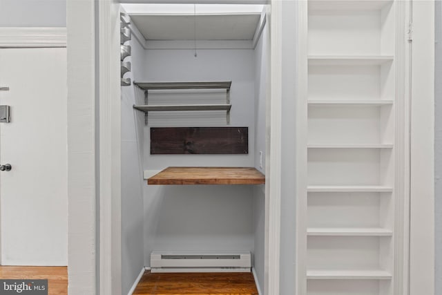 pantry with a baseboard radiator