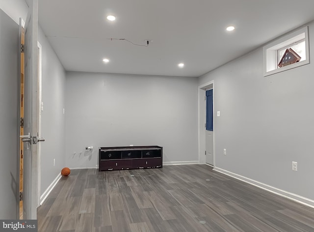 spare room with hardwood / wood-style floors