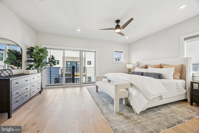 bedroom featuring ceiling fan, access to exterior, and light hardwood / wood-style flooring