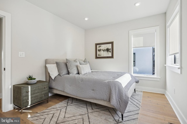 bedroom featuring light wood-type flooring