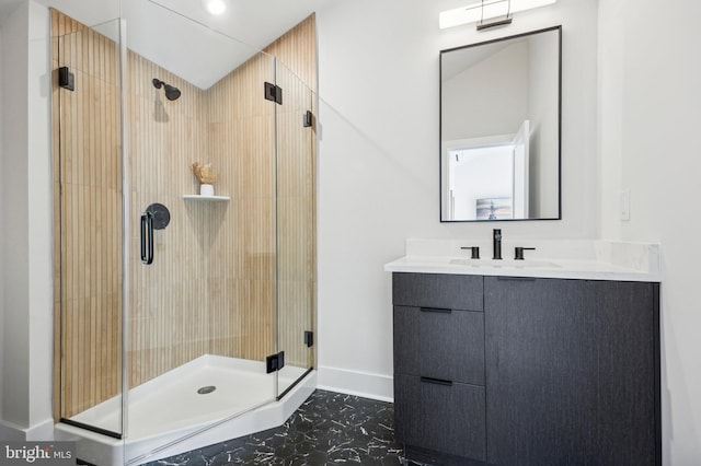 bathroom with vanity and an enclosed shower