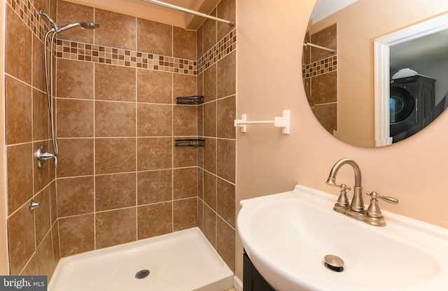 bathroom featuring sink and tiled shower