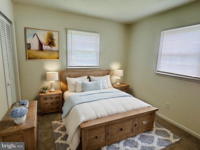 carpeted bedroom with a closet