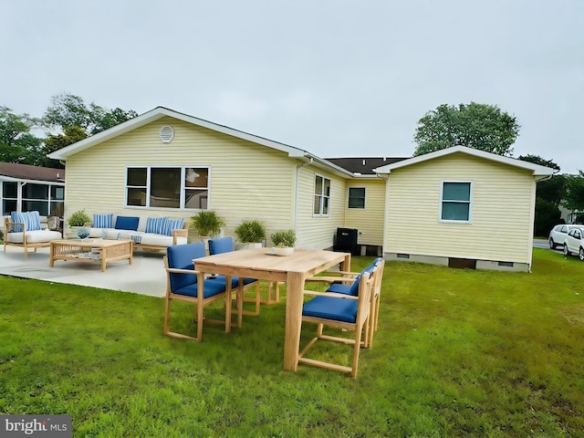 back of property with a lawn, an outdoor hangout area, and a patio