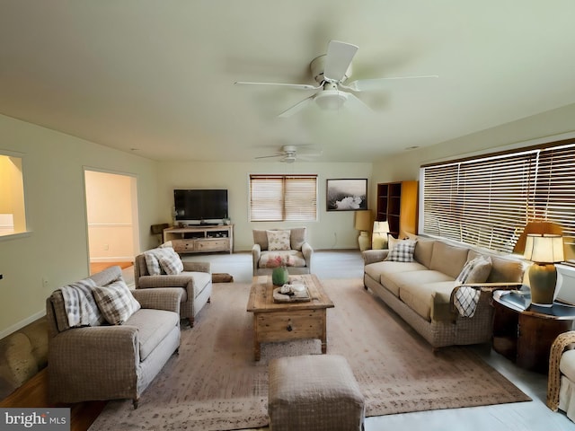 living room featuring ceiling fan