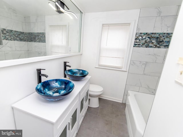 full bathroom featuring shower / bath combination, toilet, and vanity