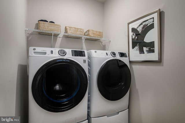 washroom featuring separate washer and dryer