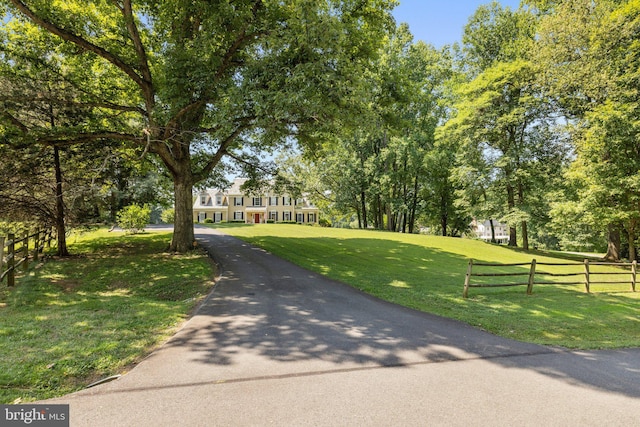 view of front of home with a front lawn