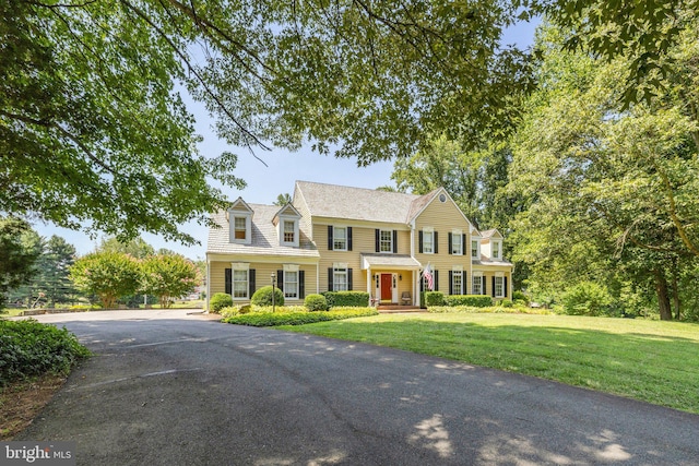 colonial house with a front yard