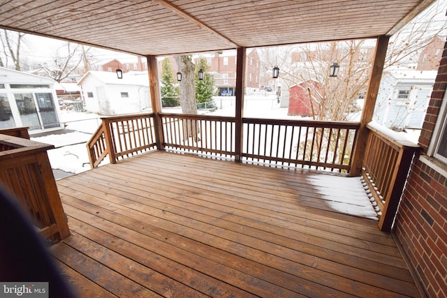 view of snow covered deck